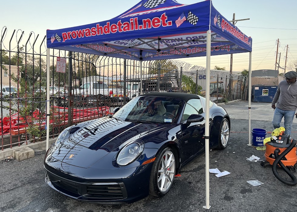 Navy blue Porsche 911 after hand washing and detailing at Pro Wash in Northeast Washington DC