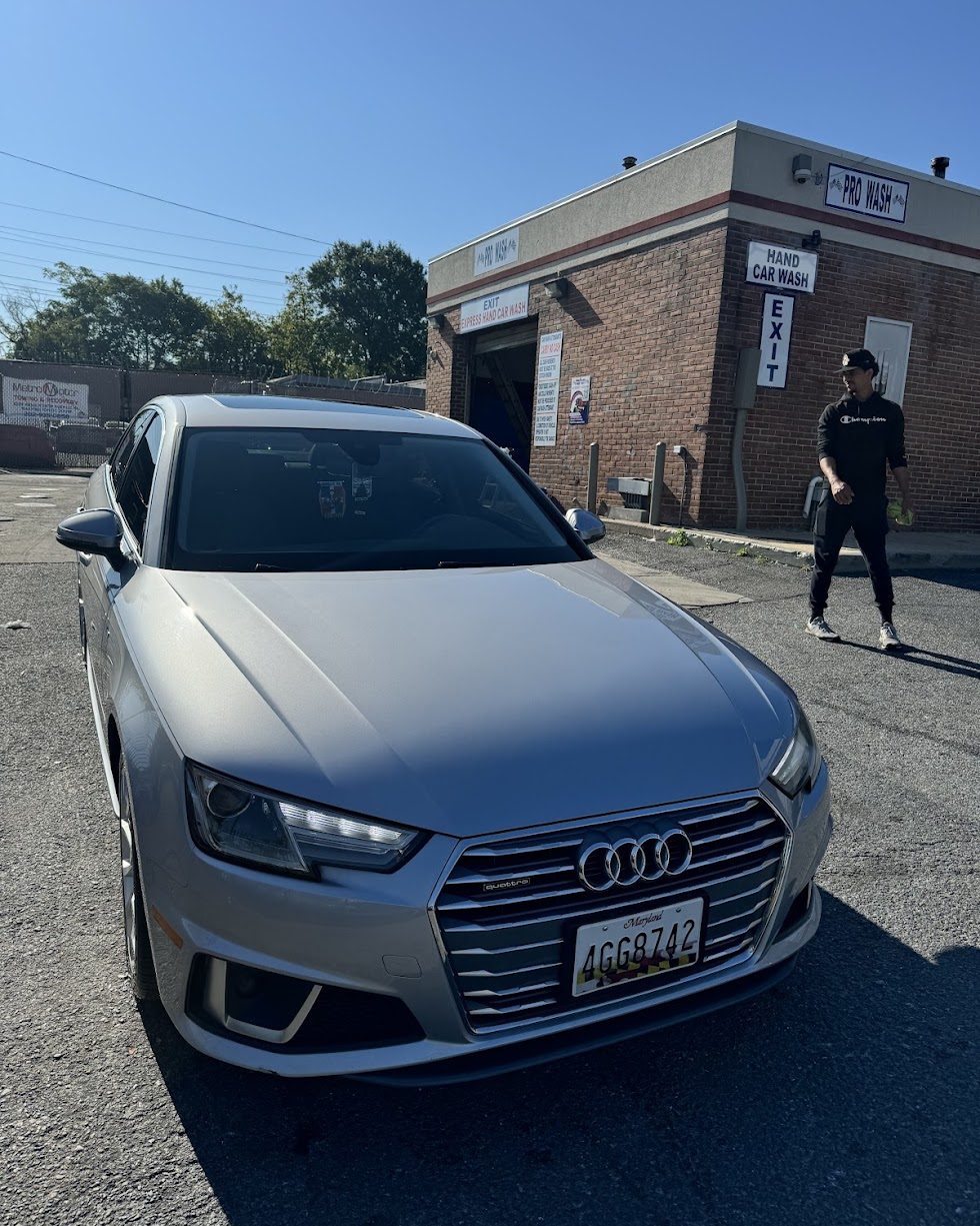 Silver Audi A4 after a full service hand wash outside the express wash bay at Pro Wash Detail, Washington DC