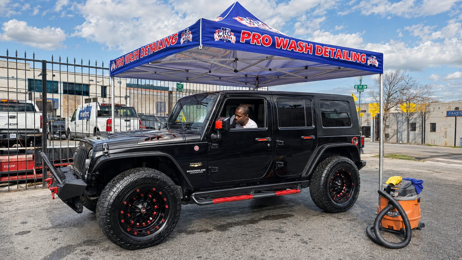 Jeep Wrangler being detailed under the Pro Wash Detailing canopy at 1329 Kenilworth Ave NE, Washington DC